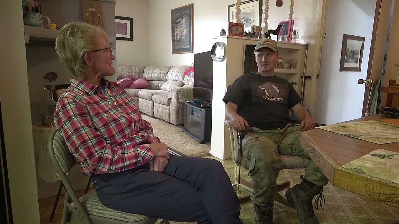 Mink Man And David Hise Telling Stories.