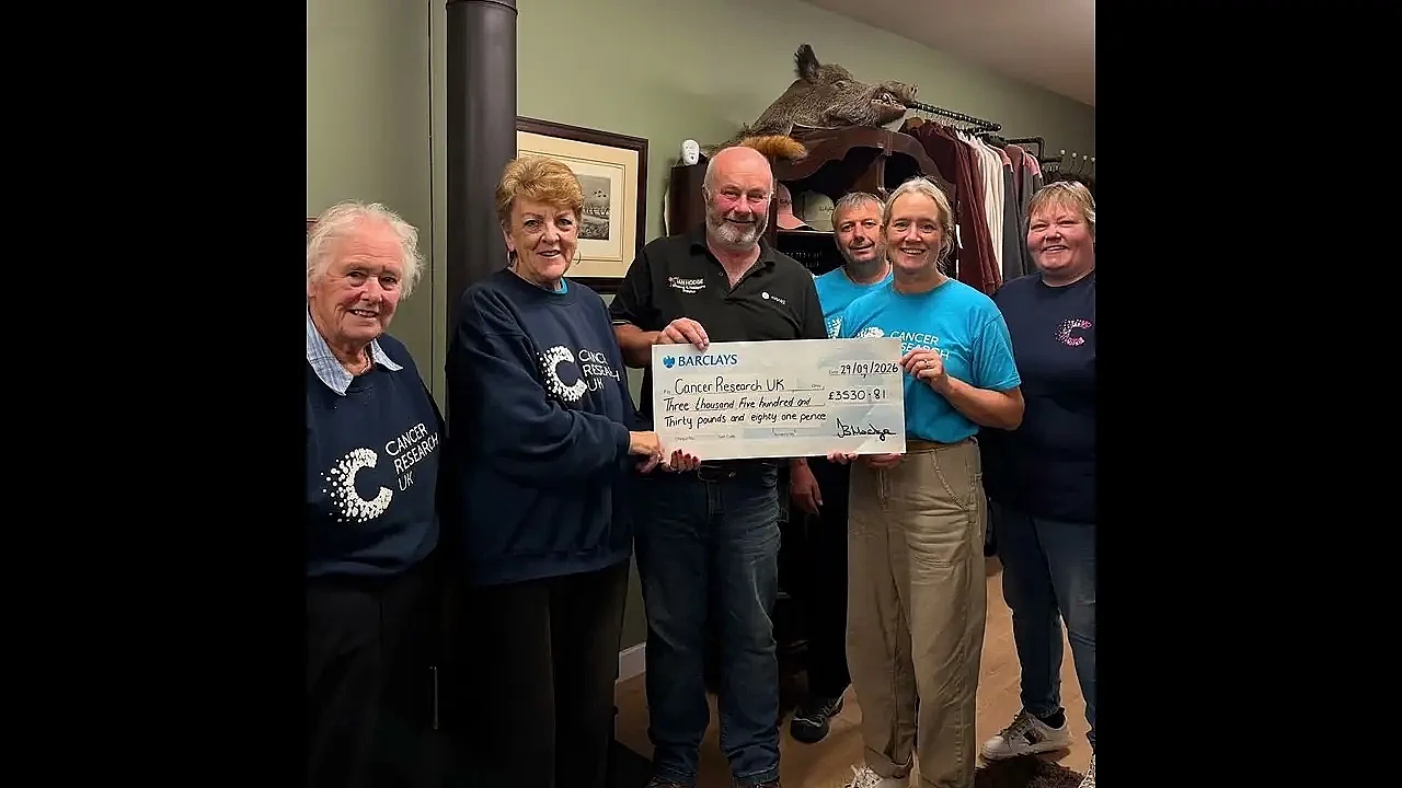 Ian Hodge’s big charity cheque