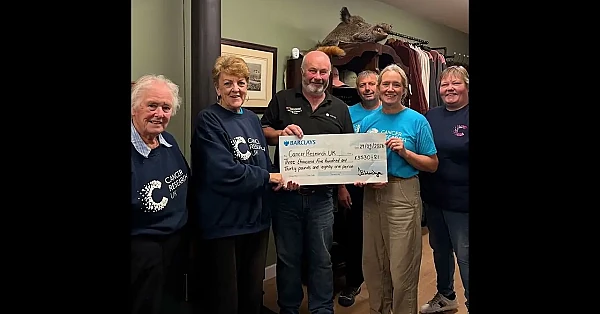 Ian Hodge’s big charity cheque