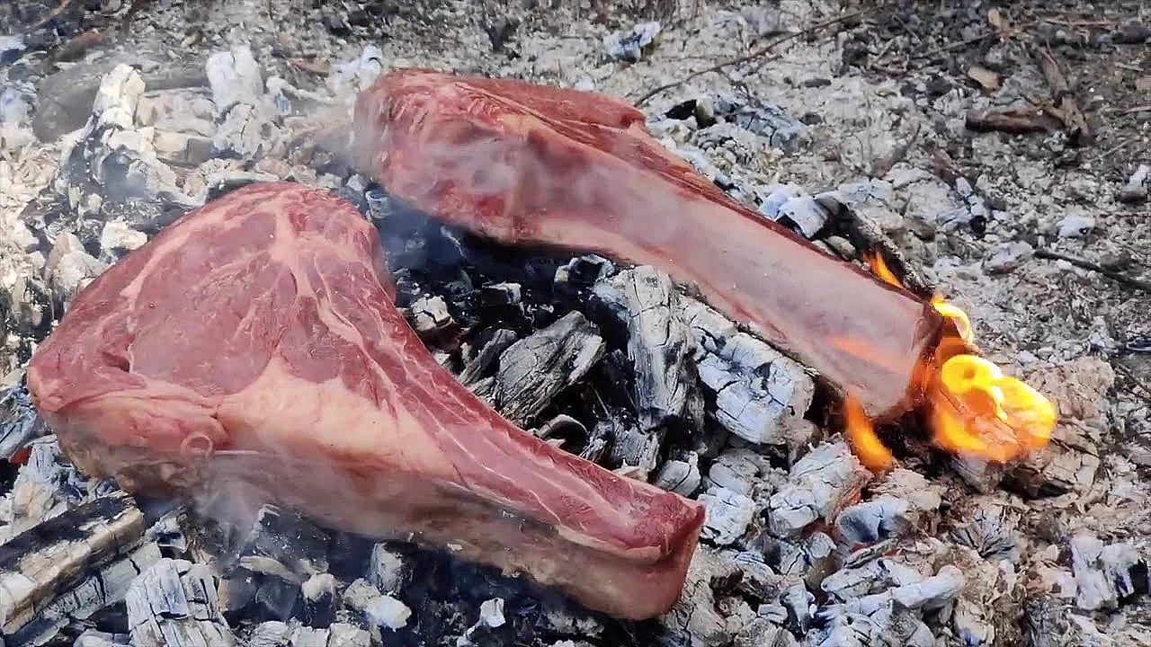 T Bone steak cooked on the coals Campfire Cooking with Josh James Charlie Sonny NZ Adventure VLOGS